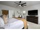 Bright, airy bedroom featuring warm accents and access to an ensuite bathroom at 2108 Remy Ct, Kennesaw, GA 30144