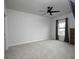 Spacious bedroom with a ceiling fan and a bright window at 2108 Remy Ct, Kennesaw, GA 30144