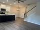 Open concept floor plan with island and stairs. Great natural light at 2108 Remy Ct, Kennesaw, GA 30144