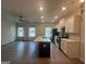 Spacious kitchen with a large island, black stainless steel appliances, and recessed lighting at 2108 Remy Ct, Kennesaw, GA 30144