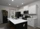 Well-equipped kitchen featuring a center island, stainless steel appliances, and modern finishes at 2108 Remy Ct, Kennesaw, GA 30144