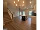 Open concept floor plan with island and stairs. Great natural light at 2108 Remy Ct, Kennesaw, GA 30144