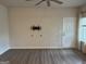 Bright living room features modern flooring, neutral walls, and a ceiling fan for added comfort at 2108 Remy Ct, Kennesaw, GA 30144