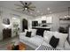 Open-concept living area featuring a modern kitchen, dining space, and comfortable seating area at 2108 Remy Ct, Kennesaw, GA 30144