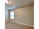 Bright and spacious bedroom with neutral carpet, trim, and walls at 620 Sedona Loop, Hampton, GA 30228