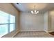 Bright dining room with modern chandelier and plenty of natural light at 620 Sedona Loop, Hampton, GA 30228