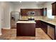 Beautiful kitchen with stainless steel appliances, granite countertops, and a central island at 620 Sedona Loop, Hampton, GA 30228