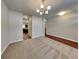 Living room featuring carpet and hardwood flooring, with views to other rooms at 620 Sedona Loop, Hampton, GA 30228