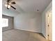 Spacious main bedroom featuring a ceiling fan, carpeted floors, and bright windows at 620 Sedona Loop, Hampton, GA 30228