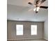 Spacious main bedroom with a ceiling fan and lots of natural light at 620 Sedona Loop, Hampton, GA 30228