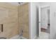 Stylish bathroom featuring tiled walls, updated fixtures, and an alcove perfect for storage at 840 Jett Rd, Jonesboro, GA 30236