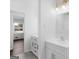 Modern bathroom with white vanity, updated fixtures, and convenient access to other rooms at 840 Jett Rd, Jonesboro, GA 30236