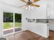 Open kitchen layout featuring stainless steel appliances and backyard access, perfect for indoor-outdoor living at 840 Jett Rd, Jonesboro, GA 30236