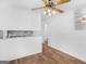 Bright kitchen with a seamless open design and modern, white cabinetry with hardwood style flooring at 840 Jett Rd, Jonesboro, GA 30236