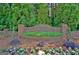 Landscaped brick sign welcomes residents and visitors to the Ridgefield community at 1801 Ridgefield Dr, Peachtree City, GA 30269