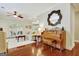 Comfortable living area featuring hardwood floors, lots of natural light, and stylish decor at 1801 Ridgefield Dr, Peachtree City, GA 30269