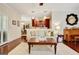Comfortable living room with a view into the modern kitchen and dining area at 1801 Ridgefield Dr, Peachtree City, GA 30269
