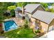 Aerial view of the home featuring a backyard with a rectangle pool and patio at 115 Champion Dr, Carrollton, GA 30116