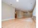 Spacious basement with natural light, recessed lighting, light wood floors, and neutral colored walls at 115 Champion Dr, Carrollton, GA 30116