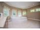 Large bathroom showcases a tile-surrounded soaking tub and neutral paint, creating a luxurious spa-like atmosphere at 115 Champion Dr, Carrollton, GA 30116