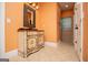 Bathroom with custom vanity, walk-in shower, and tiled floors at 115 Champion Dr, Carrollton, GA 30116