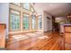 Sunny breakfast nook with large windows and custom cabinetry, perfect for enjoying meals with a view at 115 Champion Dr, Carrollton, GA 30116