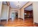 Spacious living room with gleaming hardwood floors and an open floor plan at 115 Champion Dr, Carrollton, GA 30116