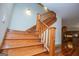 Wooden staircase leading to the second floor at 115 Champion Dr, Carrollton, GA 30116