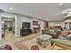 Spacious basement with wood-look flooring, media center, and open layout, perfect for entertaining at 100 Rosemont, Peachtree City, GA 30269