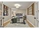 Basement bedroom features wood-look floors, a window with shutters, and a bed with side tables at 100 Rosemont, Peachtree City, GA 30269