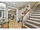 Hallway with a bench, storage baskets, and a view of the bedroom at 100 Rosemont, Peachtree City, GA 30269