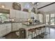 Bright kitchen with a spacious island, modern appliances, and plenty of counter space for cooking and entertaining at 100 Rosemont, Peachtree City, GA 30269
