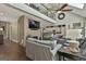 Spacious living room with a stone fireplace, vaulted ceilings, and open layout at 100 Rosemont, Peachtree City, GA 30269