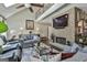 Inviting living room featuring a stone fireplace, vaulted ceilings, and stylish decor at 100 Rosemont, Peachtree City, GA 30269