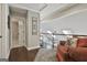 Cozy loft space with wood floors, an armchair, skylights, and a view of the home's interior at 100 Rosemont, Peachtree City, GA 30269