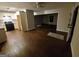 Open-concept living area with hardwood floors connects the kitchen and living room at 981 E Atlanta Rd, Stockbridge, GA 30281