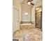 This bathroom features a soaking tub with tile surround, and glass-enclosed shower at 211 English Oaks Ln, Mcdonough, GA 30253