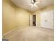 This bedroom features a neutral color scheme, carpeted floors, and a closet at 211 English Oaks Ln, Mcdonough, GA 30253