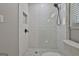 Bright bathroom features a tiled shower at 604 Magnolia Ln, Peachtree City, GA 30269