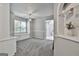 Bonus room with built-in shelving, window seat, and carpeted floors at 604 Magnolia Ln, Peachtree City, GA 30269
