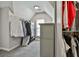 Walk-in closet features custom clothing racks and shelving at 604 Magnolia Ln, Peachtree City, GA 30269