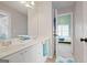 Bright bathroom with double vanity and view into the bedroom at 6317 Benbrooke Nw Overlook, Acworth, GA 30101