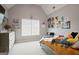 Cozy bedroom featuring light gray walls and a decorative display of posters and mementos at 6317 Benbrooke Nw Overlook, Acworth, GA 30101