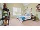 Bedroom featuring a window with natural light and decorated with colorful decor at 6317 Benbrooke Nw Overlook, Acworth, GA 30101