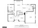 Detailed floorplan showcasing the layout of the home's first floor, including kitchen, living room, and garage at 6317 Benbrooke Nw Overlook, Acworth, GA 30101