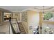 Elegant foyer with a staircase, chandelier, and large window providing lots of light at 6317 Benbrooke Nw Overlook, Acworth, GA 30101