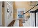 Bright foyer showcasing hardwood floors, staircase, and access to living spaces at 6317 Benbrooke Nw Overlook, Acworth, GA 30101