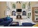 Spacious living room with custom built-ins, fireplace, and comfortable seating area at 6317 Benbrooke Nw Overlook, Acworth, GA 30101