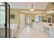 Luxurious main bathroom with dual vanities, a soaking tub, and a separate shower area at 6317 Benbrooke Nw Overlook, Acworth, GA 30101