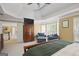 Bright main bedroom with a seating area, large windows, and plush carpeting at 6317 Benbrooke Nw Overlook, Acworth, GA 30101